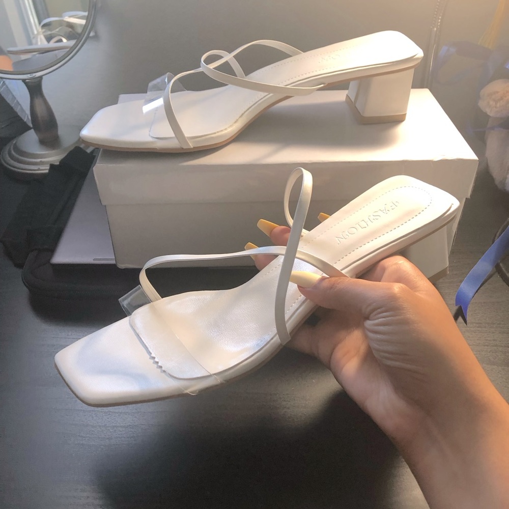 White strappy mule sandals with clear strap